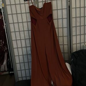 Large orange/ rust romper with cutouts by 2 saints. NWT.